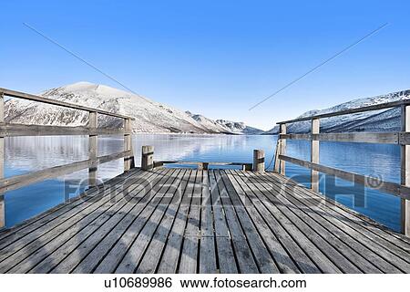 Pier on lake in Tromso, Norway View Large Photo Image Stock Photograph - Pier on lake in Tromso, Norway. Fotosearch