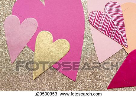 Pink and gold paper hearts View Large Photo Image Stock Image - Pink and gold paper hearts. Fotosearch