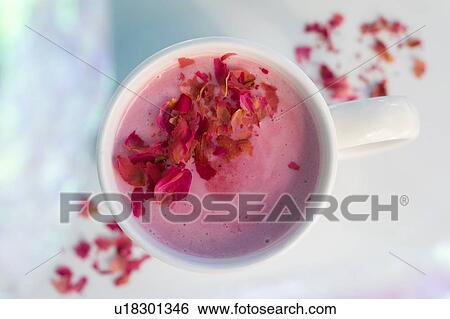 Pink drink topped with petals View Large Photo Image Stock Photograph - Pink drink topped with petals. Fotosearch