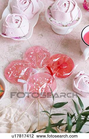Pink lollipops and marshmallow View Large Photo Image Stock Image - Pink lollipops and marshmallow. Fotosearch