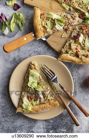 Stock Image - Pizza topped with cabbage. Fotosearch