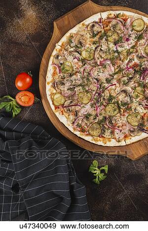 Pizza with pickles and red onion View Large Photo Image Stock Photo - Pizza with pickles and red onion. Fotosearch