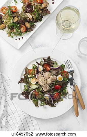 Plate of salad with white wine View Large Photo Image Stock Image - Plate of salad with white wine. Fotosearch