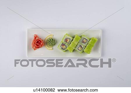 Plate of sushi with pickled ginger and wasabi View Large Photo Image Stock Image - Plate of sushi with pickled ginger and wasabi. Fotosearch