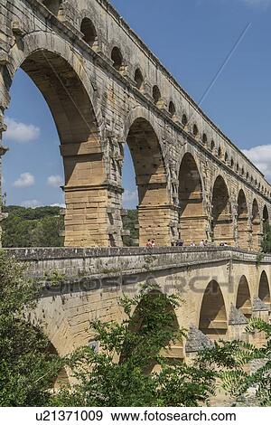Pont du Gard in Vers-Pont-du-Gard, France View Large Photo Image Stock Photo - Pont du Gard in Vers-Pont-du-Gard, France. Fotosearch