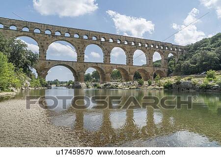 Pont du Gard over Gardon River in Vers-Pont-du-Gard, France View Large Photo Image Stock Image - Pont du Gard over Gardon River in Vers-Pont-du-Gard, France. Fotosearch