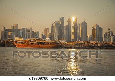 Stock Image - Port by skyline of Doha, Qatar. Fotosearch