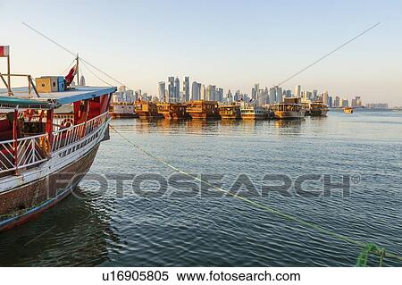 Port by skyline of Doha, Qatar View Large Photo Image Stock Photography - Port by skyline of Doha, Qatar. Fotosearch