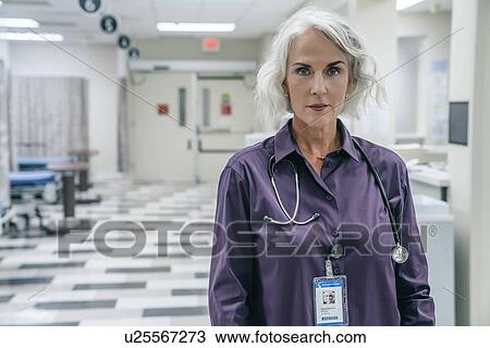 Portrait of doctor with stethoscope View Large Photo Image Stock Image - Portrait of doctor with stethoscope. Fotosearch