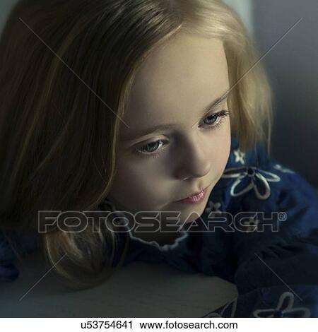 Stock Image - Portrait of girl in shadow. Fotosearch