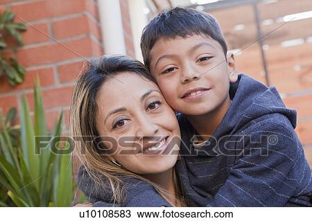 Stock Image - Portrait of mother and son. Fotosearch