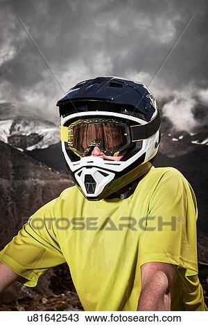 Portrait of mountain biker wearing helmet, Saas-Fee, Valais, Switzerland View Large Photo Image Stock Image - Portrait of mountain biker wearing helmet, Saas-Fee, Valais, Switzerland. Fotosearch