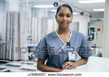 Stock Image - Portrait of nurse in hospital. Fotosearch