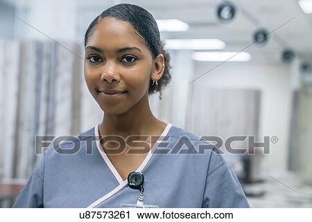 Stock Image - Portrait of nurse in hospital. Fotosearch