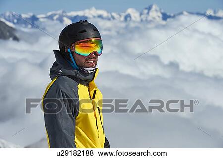 Stock Photo - Portrait of skier, Saas-Fee, Valais, Switzerland. Fotosearch