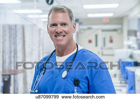 Stock Photo - Portrait of smiling doctor with stethoscopes. Fotosearch