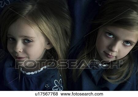 Stock Photo - Portrait of two sisters. Fotosearch