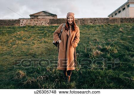 Portrait of woman on grassy hill, Calton Hill, Edinburgh, Scotland View Large Photo Image Stock Photo - Portrait of woman on grassy hill, Calton Hill, Edinburgh, Scotland. Fotosearch