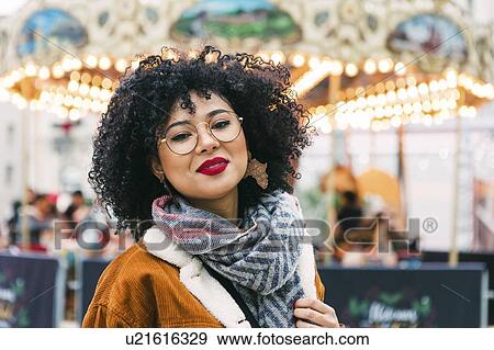 Portrait of young woman wearing glasses and red lipstick View Large Photo Image Stock Photo - Portrait of young woman wearing glasses and red lipstick. Fotosearch