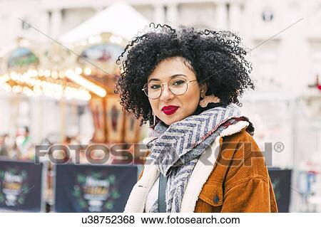 Portrait of young woman wearing glasses and red lipstick View Large Photo Image Stock Photo - Portrait of young woman wearing glasses and red lipstick. Fotosearch
