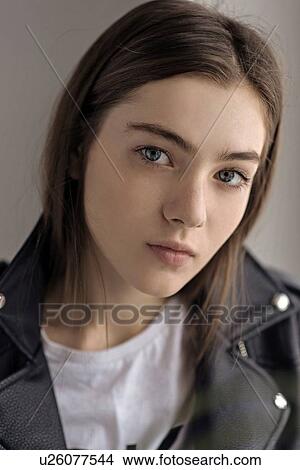 Picture - Portrait of young woman with brown hair. Fotosearch