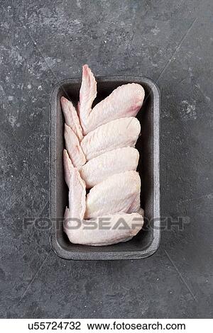 Raw chicken wings in roasting pan View Large Photo Image Stock Image - Raw chicken wings in roasting pan. Fotosearch