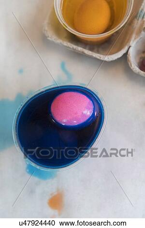 Raw egg dyed blue and pink View Large Photo Image Stock Image - Raw egg dyed blue and pink. Fotosearch