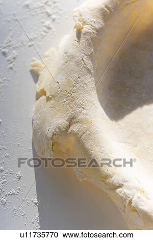 Stock Image - Raw pie crust. Fotosearch