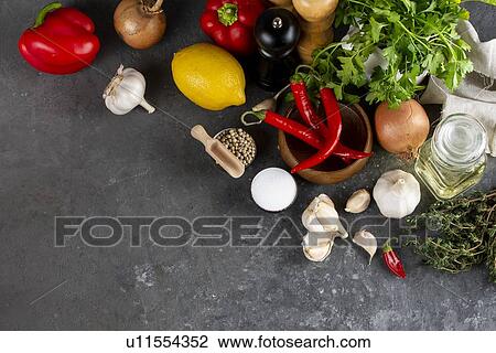 Raw vegetable ingredients with chili peppers View Large Photo Image Stock Image - Raw vegetable ingredients with chili peppers. Fotosearch