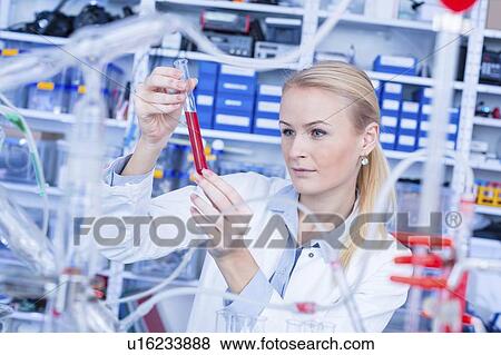 Stock Photo - Researcher in chemistry lab.. Fotosearch