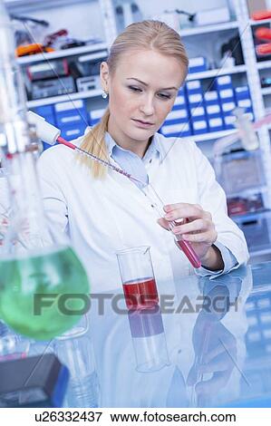 Researcher in chemistry lab. View Large Photo Image Stock Photo - Researcher in chemistry lab.. Fotosearch