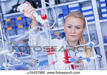 Stock Photography - Researcher in chemistry lab.. Fotosearch
