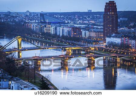 Stock Image - River Maine at sunset through Frankfurt, Germany. Fotosearch