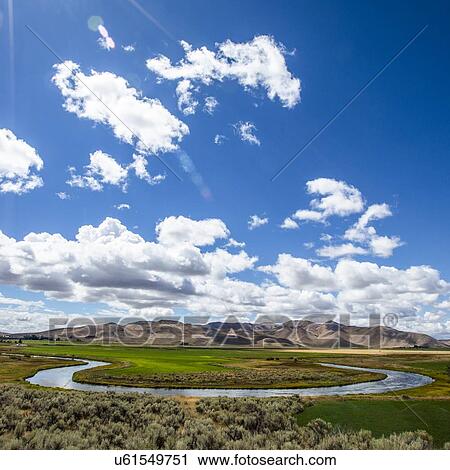 River through field in Picabo, Idaho, USA View Large Photo Image Stock Image - River through field in Picabo, Idaho, USA. Fotosearch