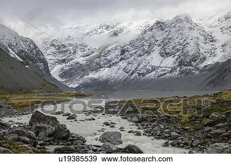 Stock Photo - River through Hooker Valley in Mount Cook National Park, New Zealand. Fotosearch