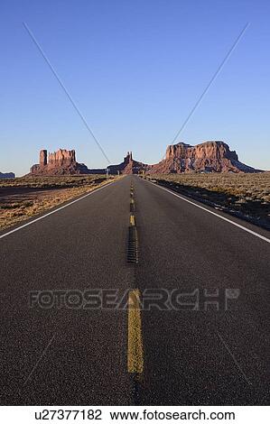 Stock Image - Road through Monument Valley in Utah, USA. Fotosearch