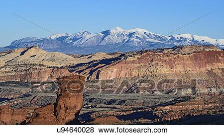 Stock Photo - Rock formations and mountain landscape in Capitol Reef National Park, USA. Fotosearch