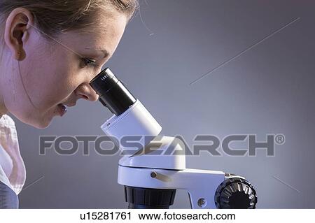 Scientist using microscope. View Large Photo Image Stock Image - Scientist using microscope.. Fotosearch