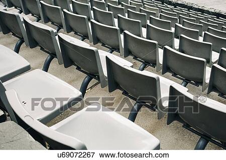 Seats in stadium View Large Photo Image Stock Photo - Seats in stadium. Fotosearch