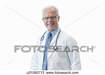 Senior male doctor smiling, studio shot. View Large Photo Image Stock Image - Senior male doctor smiling, studio shot.. Fotosearch