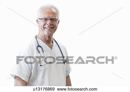 Stock Photo - Senior male doctor smiling towards camera, portrait.. Fotosearch