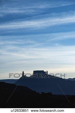 Stock Image - Silhouette of buttes in Arches National Park, Utah. Fotosearch