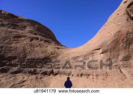 Silhouette of woman by rock formation in Monument Valley, Arizona, USA View Large Photo Image Stock Photo - Silhouette of woman by rock formation in Monument Valley, Arizona, USA. Fotosearch