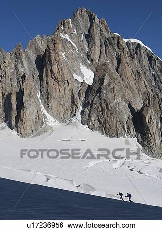Silhouettes of hikers on Mer de Glace in Mont Blanc massif, France View Large Photo Image Stock Photograph - Silhouettes of hikers on Mer de Glace in Mont Blanc massif, France. Fotosearch
