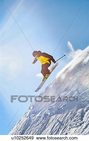 Skier moving down slopes, Saas-Fee, Valais, Switzerland View Large Photo Image Stock Photo - Skier moving down slopes, Saas-Fee, Valais, Switzerland. Fotosearch