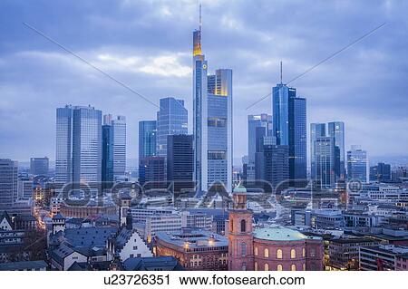 Stock Image - Skyline at sunset in Frankfurt, Germany. Fotosearch