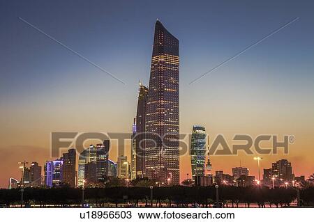 Stock Image - Skyline at sunset in Kuwait City, Kuwait. Fotosearch