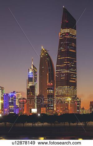 Stock Photo - Skyline at sunset in Kuwait City, Kuwait. Fotosearch