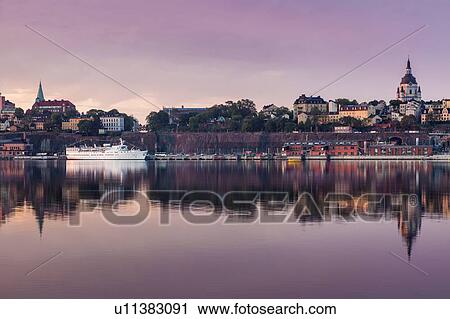 Stock Image - Skyline at sunset in Stockholm, Sweden. Fotosearch