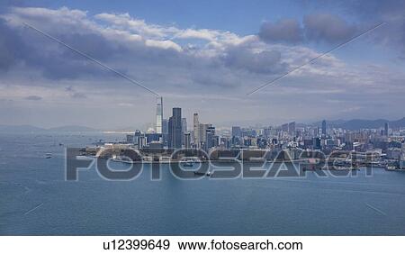 Stock Photo - Skyline by sea in Hong Kong, China. Fotosearch